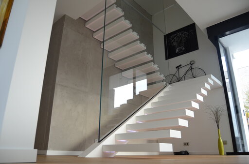 Corian LED – Floating cantilever staircase with integrated lighting design