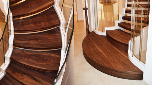 Cobra White – Curved designer staircase with sculptural lines