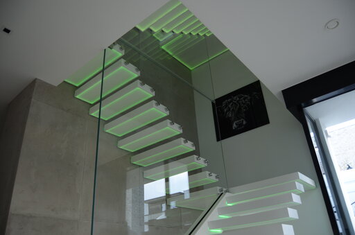 Corian LED – Floating cantilever staircase with integrated lighting design